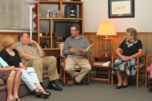 Supervising Psychologist Dr. Steve Meharg (Center) and Program Administrator Rev. Elizabeth Meharg (Right) facilitate a training session for our counselors.